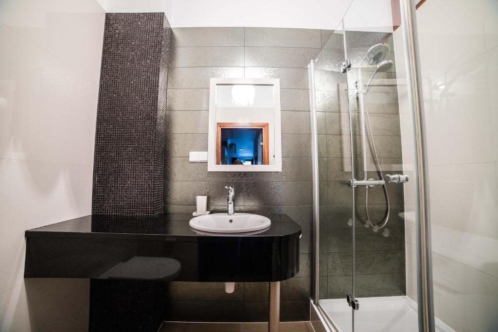 Kúpeľňa v ubytovaní CracWoW VIP Apartment