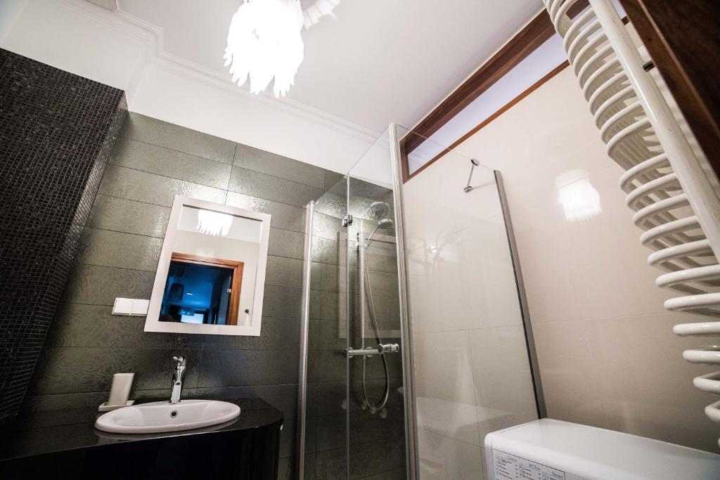 Kúpeľňa v ubytovaní CracWoW VIP Apartment