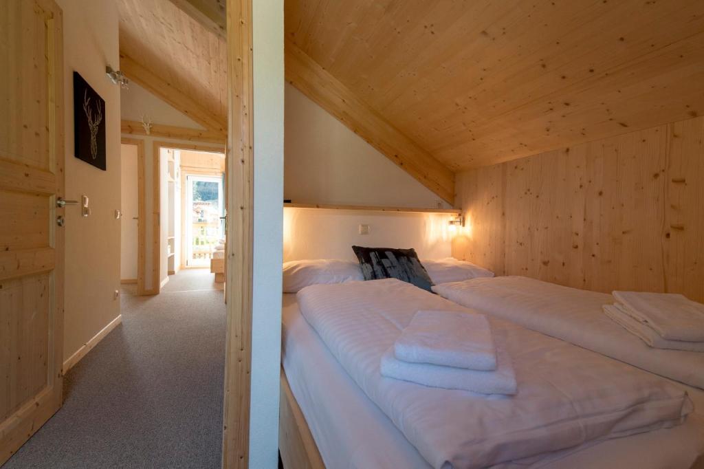 Postel nebo postele na pokoji v ubytování Hirsch Chalet