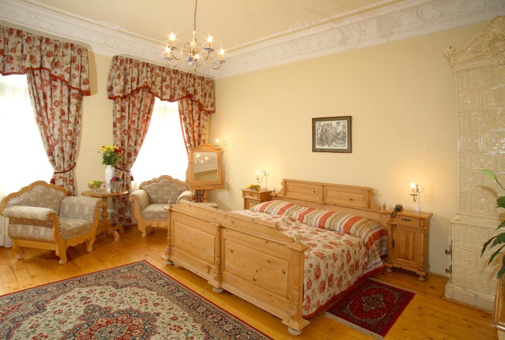 Postel nebo postele na pokoji v ubytování Hotel Heluan