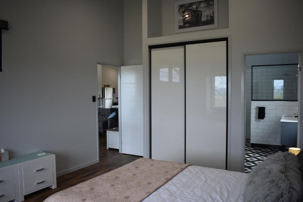 Postel nebo postele na pokoji v ubytování Ironbark House