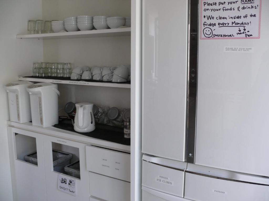 Kuchyň nebo kuchyňský kout v ubytování Piece Hostel Kyoto