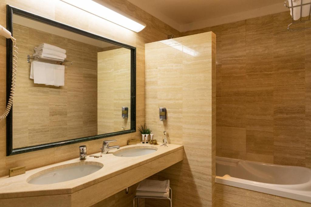 Koupelna v ubytování Hotel Alga