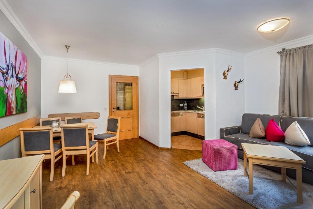 Kuchyň nebo kuchyňský kout v ubytování ALMHOF Alpin Apartments & Spa
