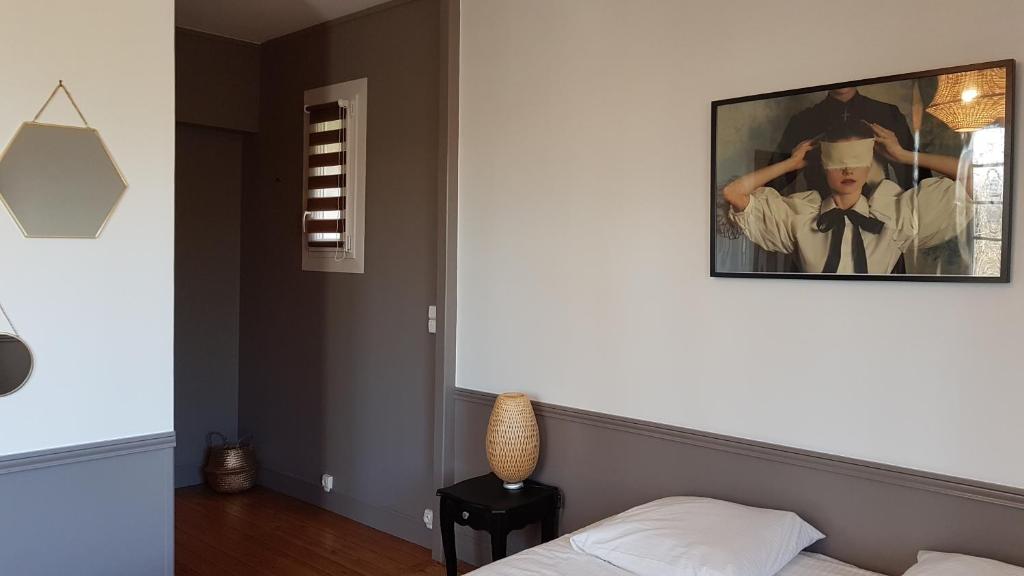 Postel nebo postele na pokoji v ubytování Maison d'hôtes Il était une fois