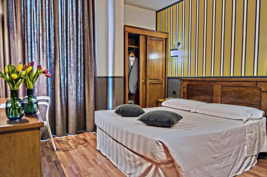 Łóżko lub łóżka w pokoju w obiekcie Hotel Golf