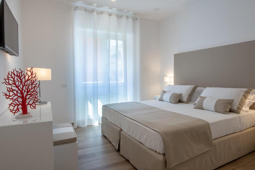 Posteľ alebo postele v izbe v ubytovaní Solymar Apartments