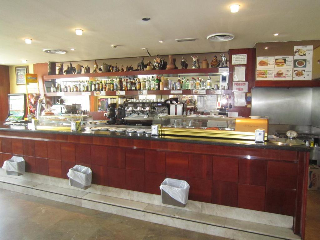 El salón o zona de bar de Hotel Concordy