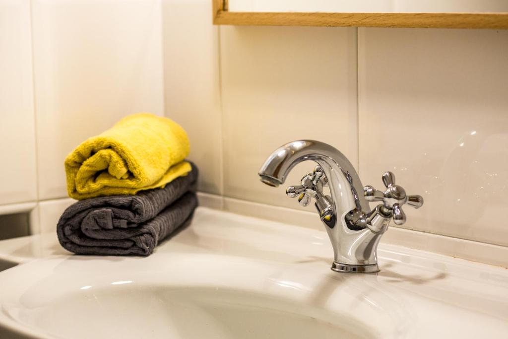 Kúpeľňa v ubytovaní Albergo Diffuso ELA Living - Design Apartment & Room
