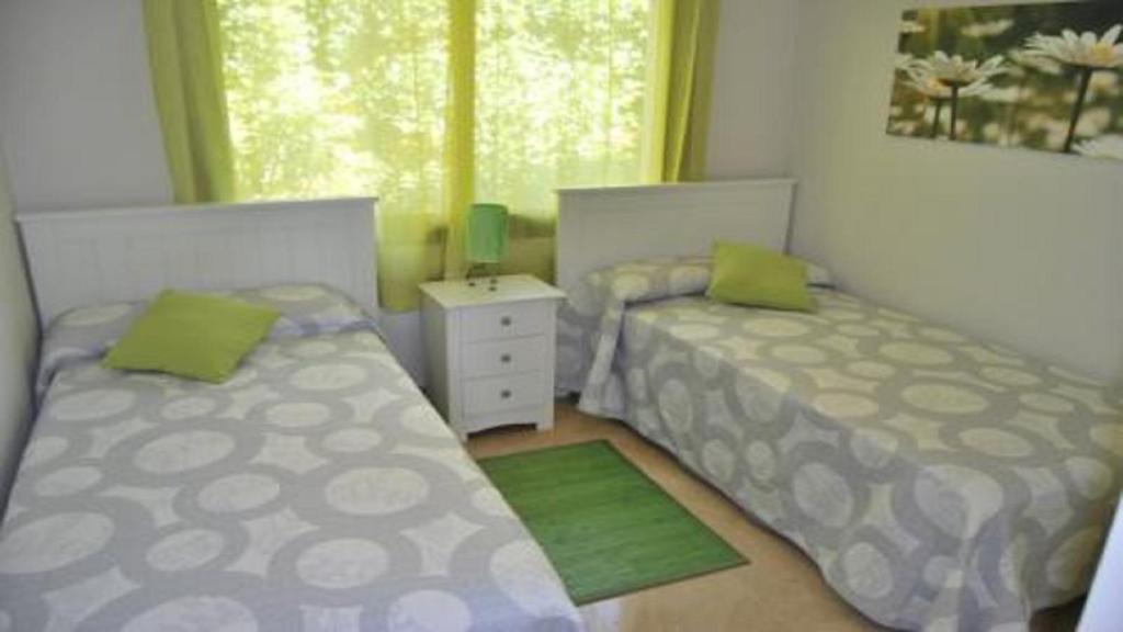 Postel nebo postele na pokoji v ubytování Apartamento 6 persona en la Alcaidesa