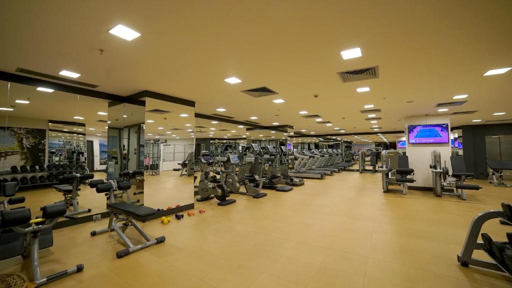 a large gym with rows of treadms and machines at Point Hotel Taksim in Istanbul