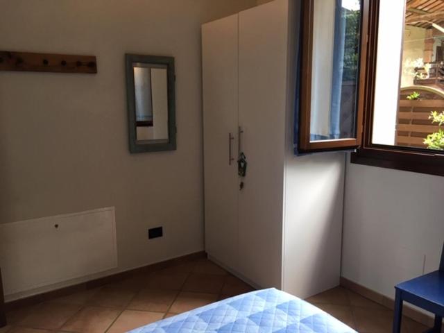 Łóżko lub łóżka w pokoju w obiekcie Locanda Camera con Vista