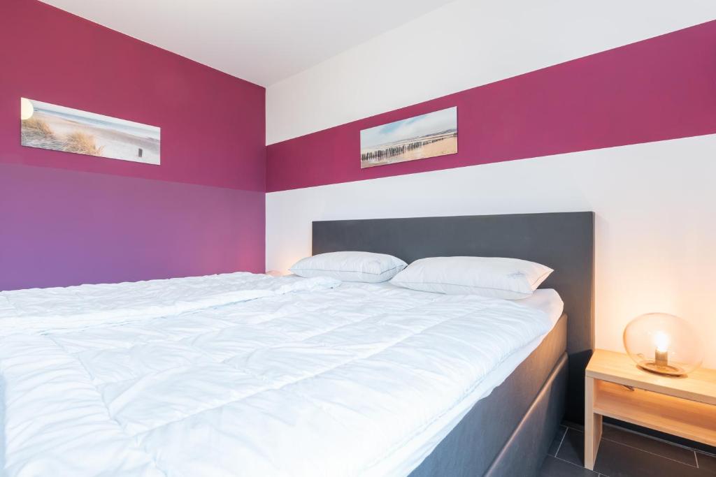 Postel nebo postele na pokoji v ubytování Haus Calmsailing