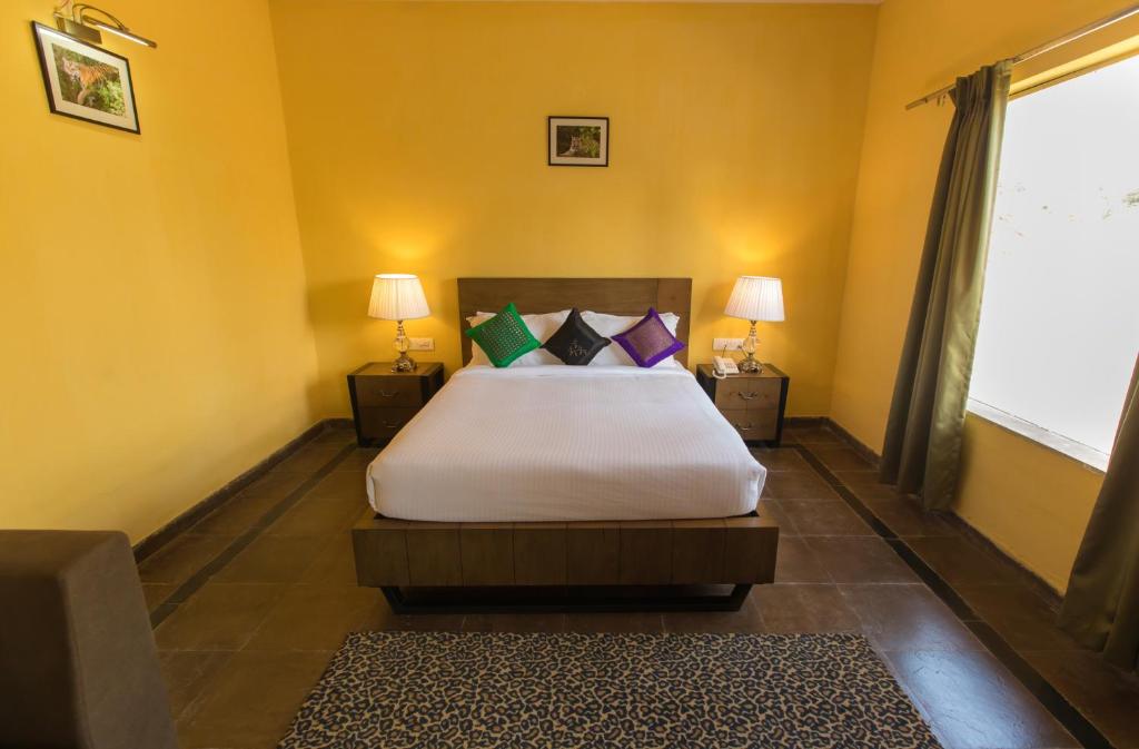 Postel nebo postele na pokoji v ubytování Tuli Veer Bagh Resort