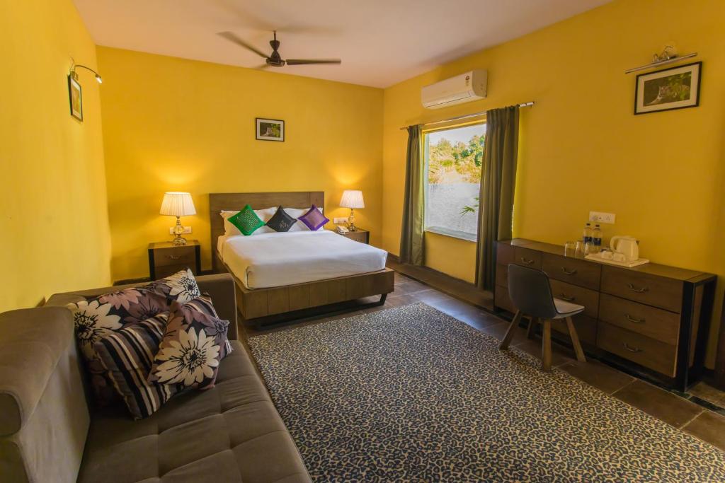 Postel nebo postele na pokoji v ubytování Tuli Veer Bagh Resort