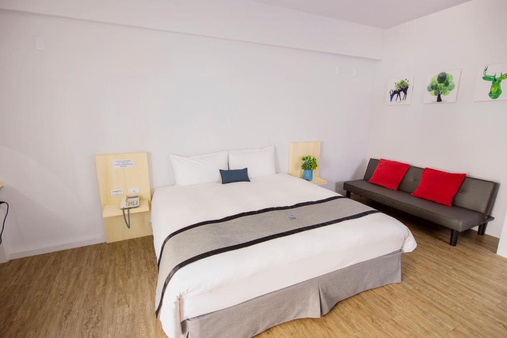 Postel nebo postele na pokoji v ubytování Youngs Hotspring Hotel