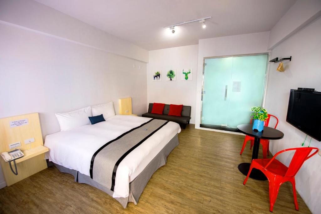 Postel nebo postele na pokoji v ubytování Youngs Hotspring Hotel