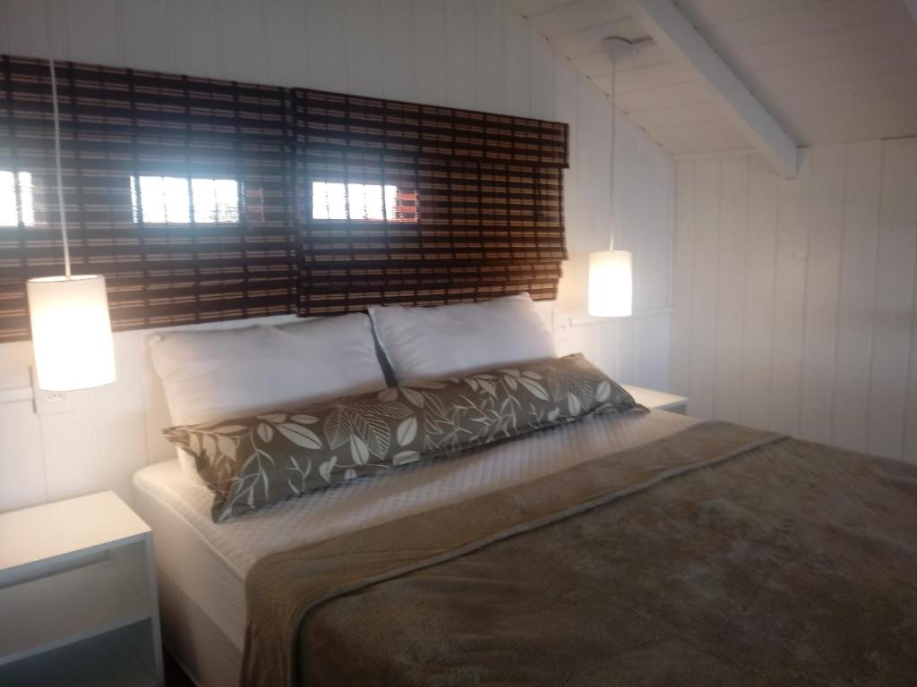 Postel nebo postele na pokoji v ubytování Praia do Rosa para casais