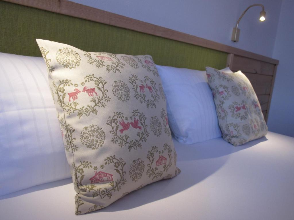 Postel nebo postele na pokoji v ubytování Gästehaus Bergstüberl