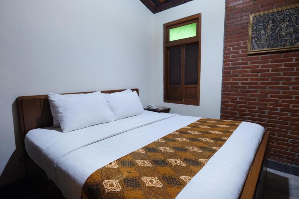 Letto o letti in una camera di Melva Balemong