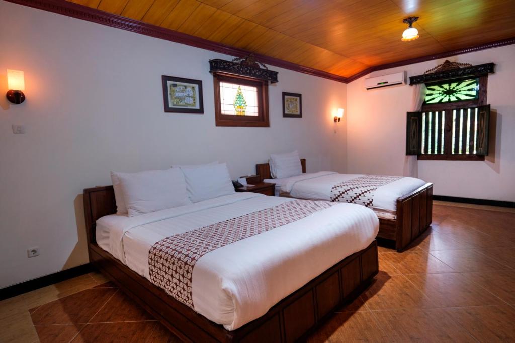 Letto o letti in una camera di Melva Balemong