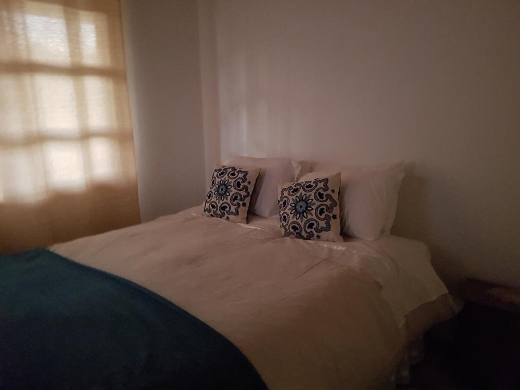 Postel nebo postele na pokoji v ubytování Casa de Campo Catapilco