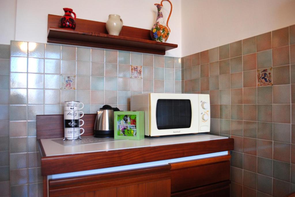 Kuchnia lub aneks kuchenny w obiekcie Bnbook-Costantino