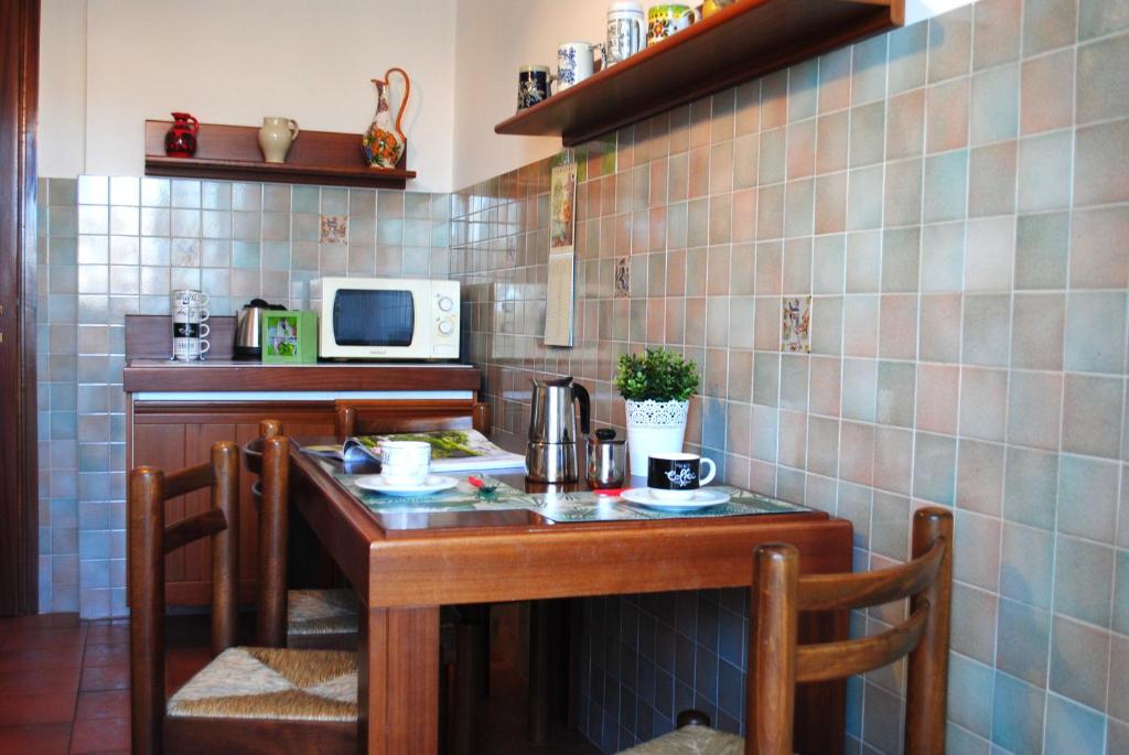 Kuchnia lub aneks kuchenny w obiekcie Bnbook-Costantino