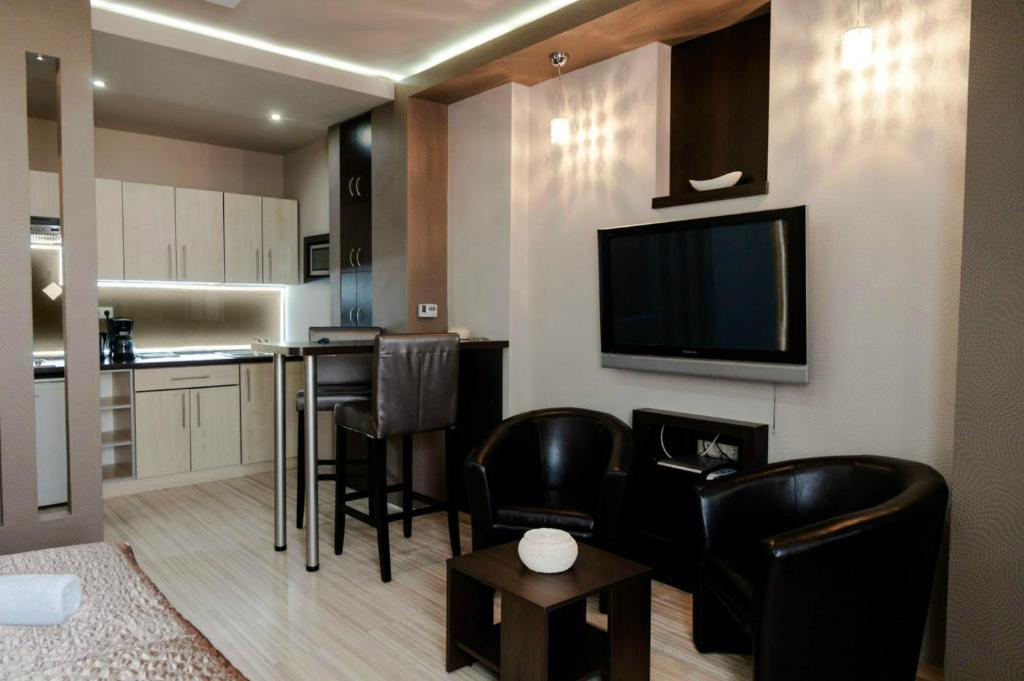 Kuchyň nebo kuchyňský kout v ubytování Royal Apartments Hotel Kecskemét