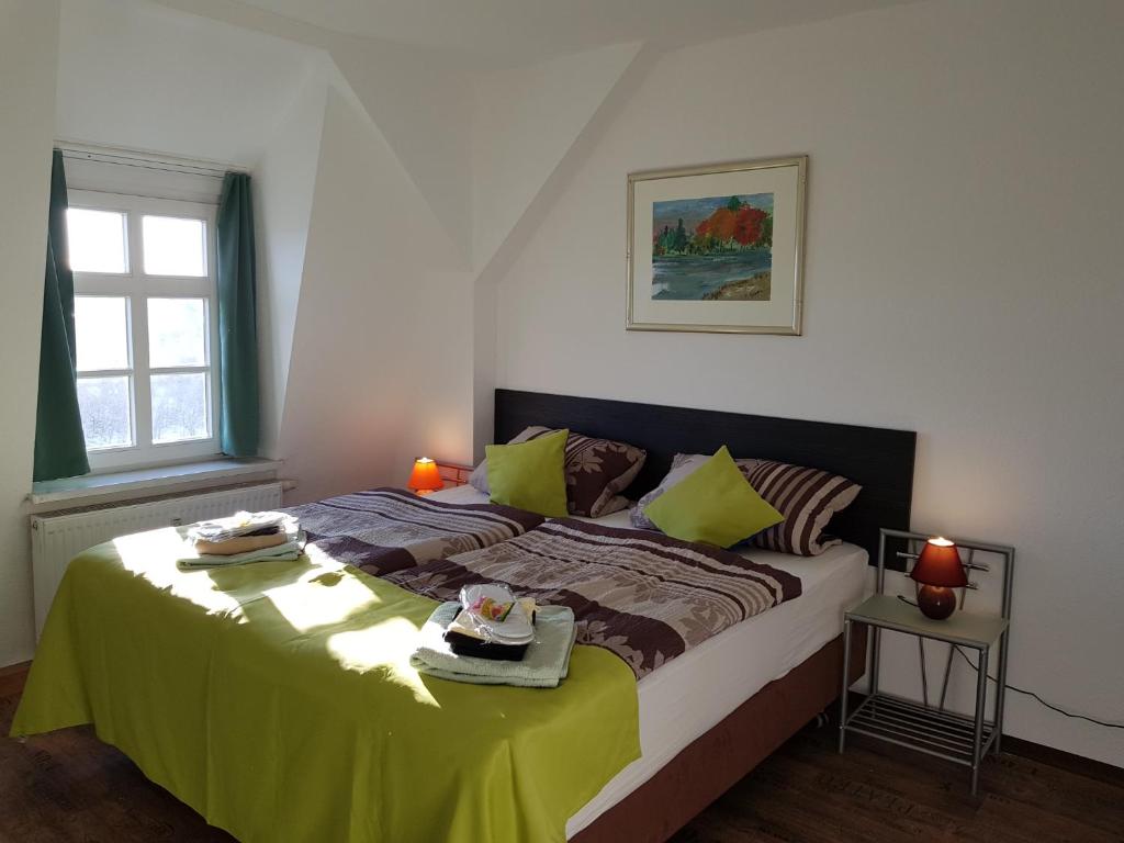 Postel nebo postele na pokoji v ubytování Apartments Vogtlandblick