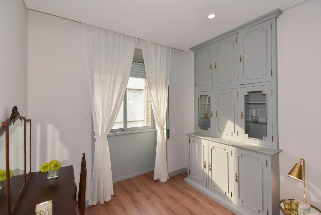 Rosario's Boutique Apartments - 11