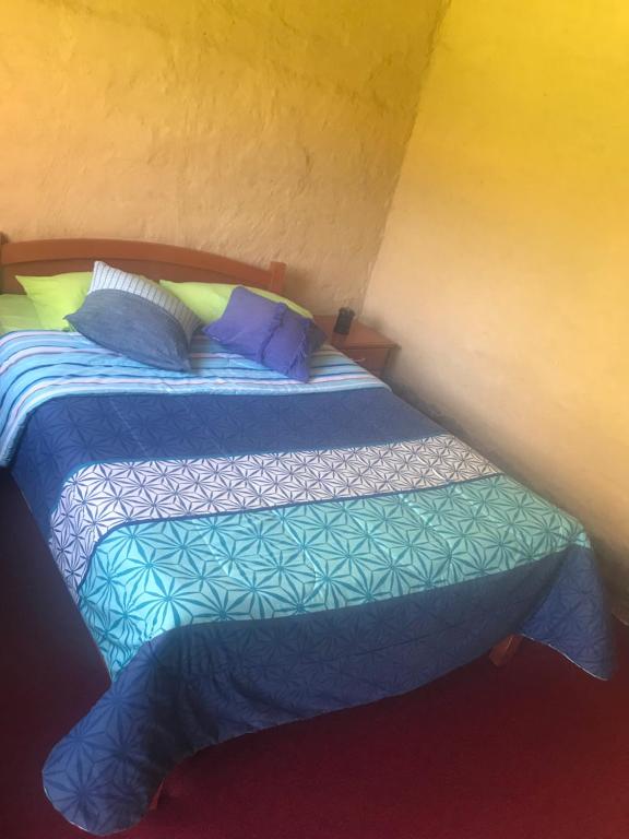 Postel nebo postele na pokoji v ubytování Posada Gloria