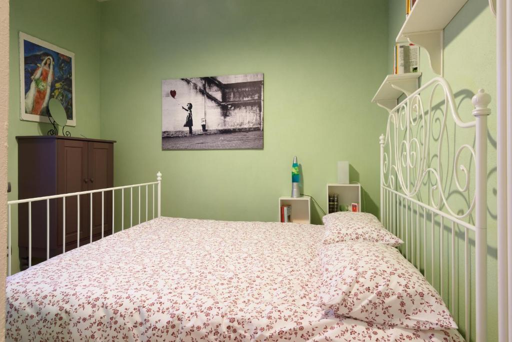 Posteľ alebo postele v izbe v ubytovaní In Arezzo Apartment