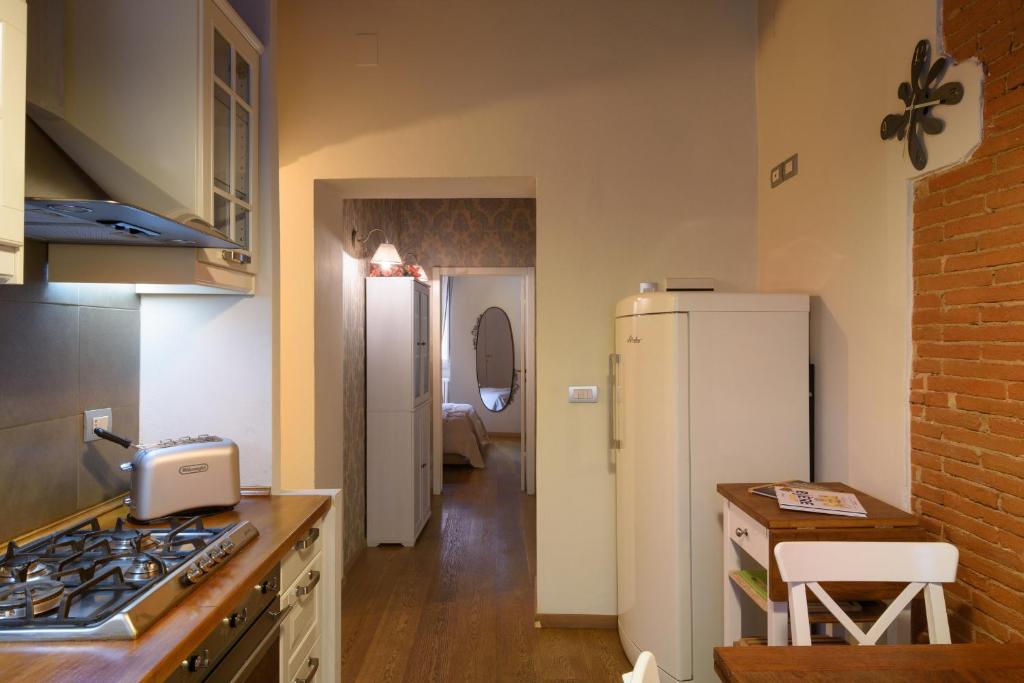 Kuchyňa alebo kuchynka v ubytovaní In Arezzo Apartment