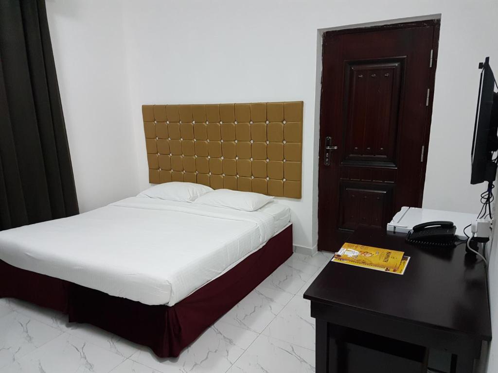Voodi või voodid majutusasutuse Sea Hotel Apartment toas