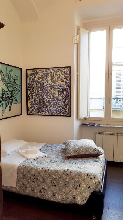 Postel nebo postele na pokoji v ubytování Albergo Ristorante San Giors