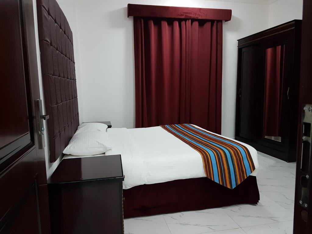 Voodi või voodid majutusasutuse Sea Hotel Apartment toas