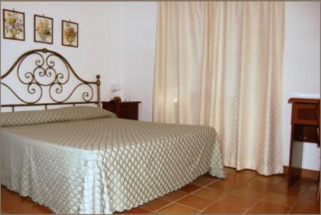 Postel nebo postele na pokoji v ubytování Albergo Belvedere