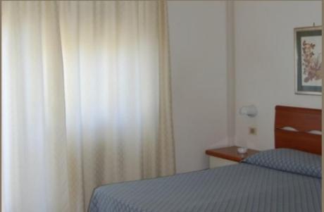 Postel nebo postele na pokoji v ubytování Albergo Belvedere