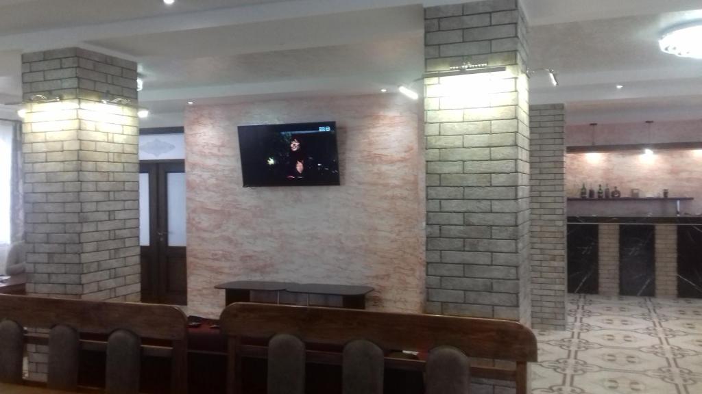 TV a/nebo společenská místnost v ubytování Kreitser