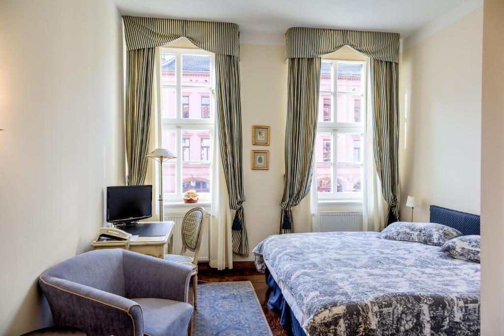 Postel nebo postele na pokoji v ubytování Hotel Zum Bär