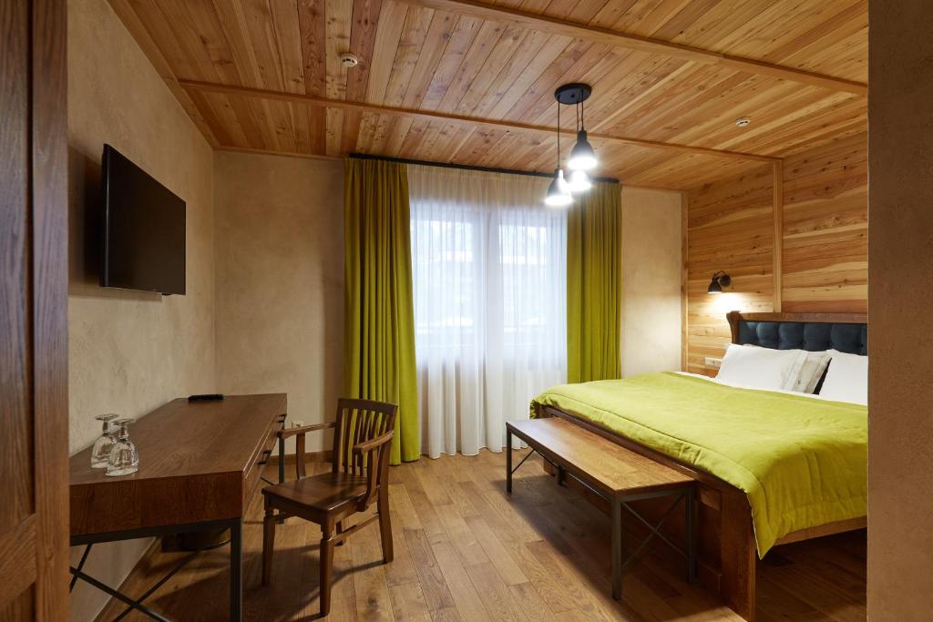 Кровать или кровати в номере Ганц & Spa