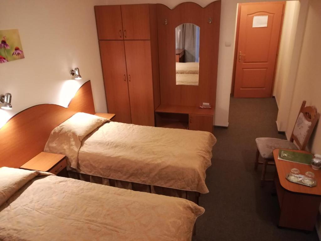 Postel nebo postele na pokoji v ubytování Hotel Everest