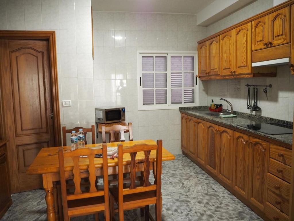 A kitchen or kitchenette at apartamentos la villa 2