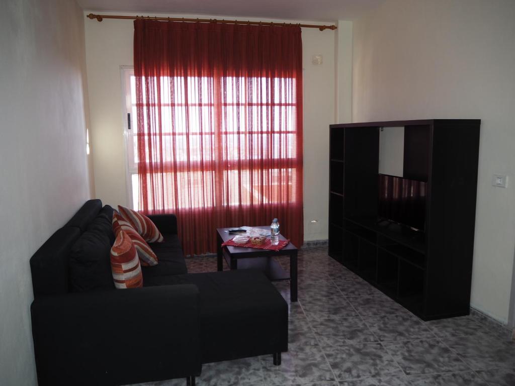 A seating area at apartamentos la villa 2