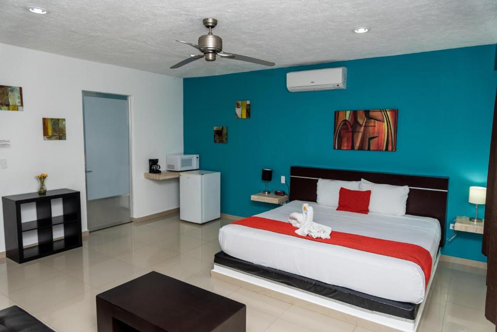 Postel nebo postele na pokoji v ubytování Hotel Playa Encantada