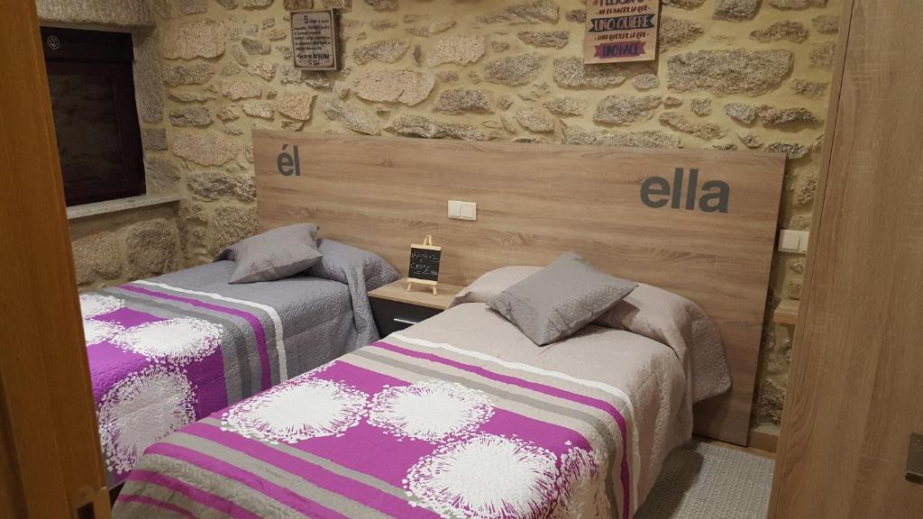 Postel nebo postele na pokoji v ubytování CASA Eiró