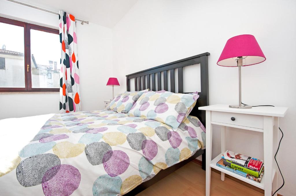 Cama o camas de una habitación en Apartments Alluro