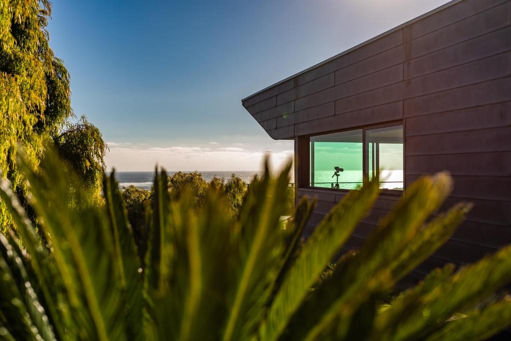 a house with a view of the ocean at The Roozen Residence in Prevelly