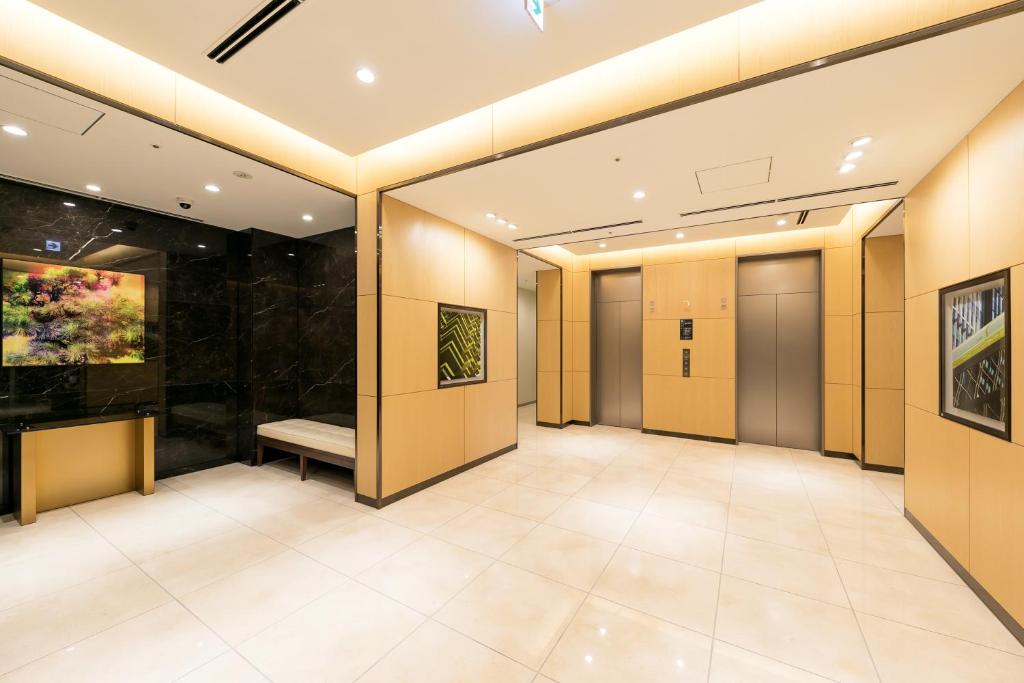 TV a/nebo společenská místnost v ubytování Ginza Capital Hotel Moegi